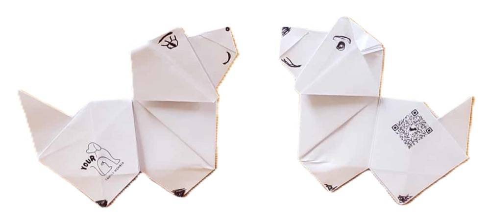 Two white origami dogs